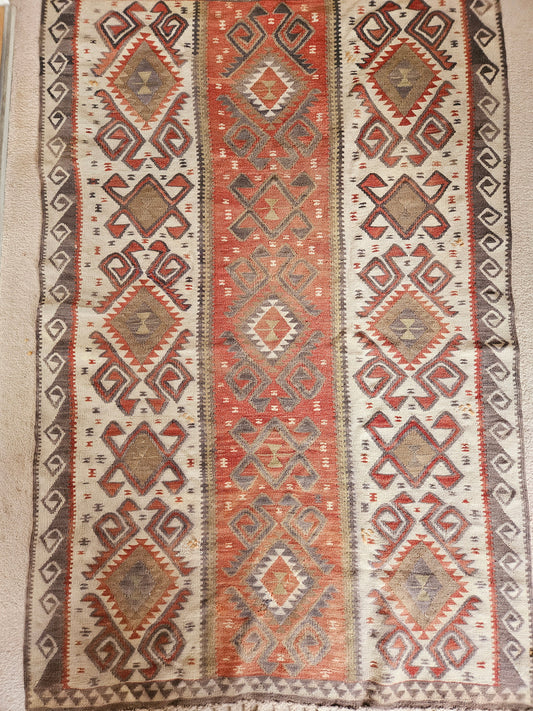 Burnt orange tribal kilim