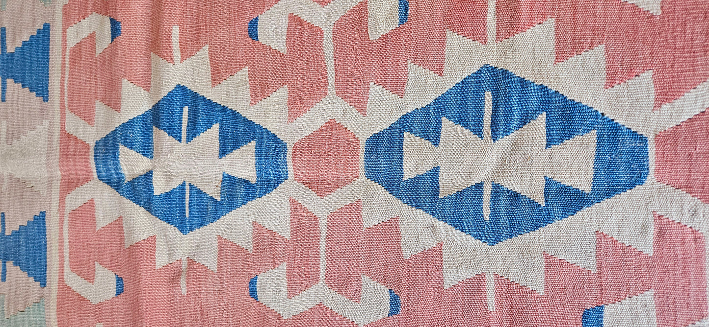 Blush and mint green vintage turkish kilim.