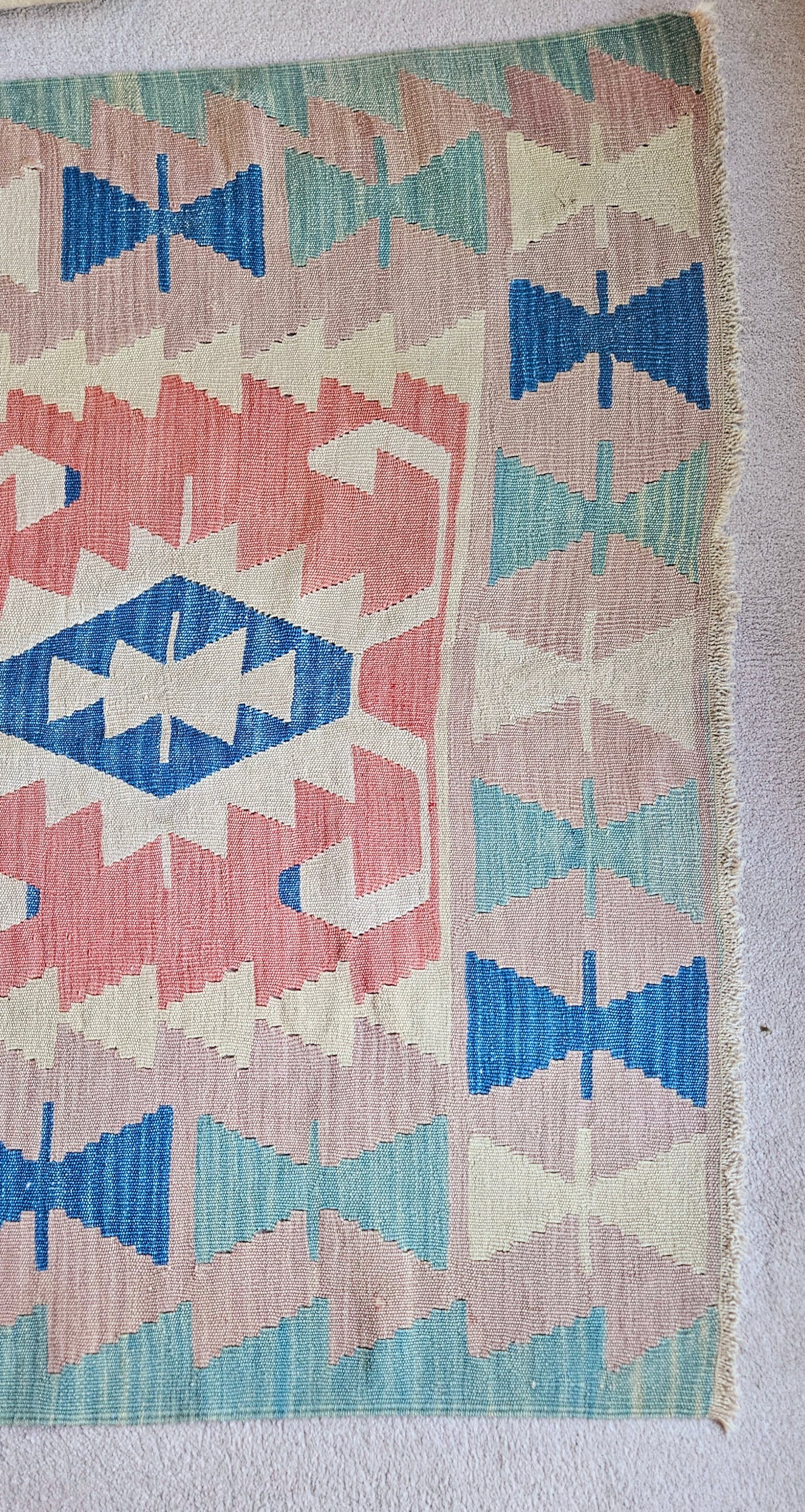 Blush and mint green vintage turkish kilim.