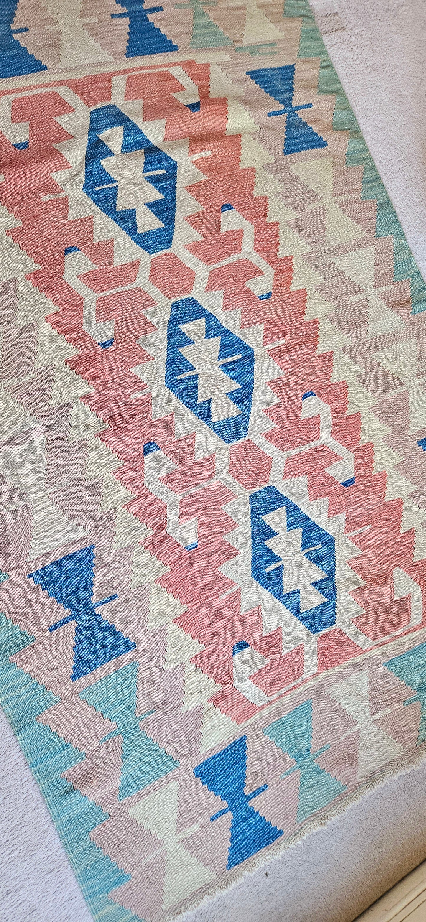 Blush and mint green vintage turkish kilim.