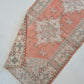 Deep peach runner rug. Florals