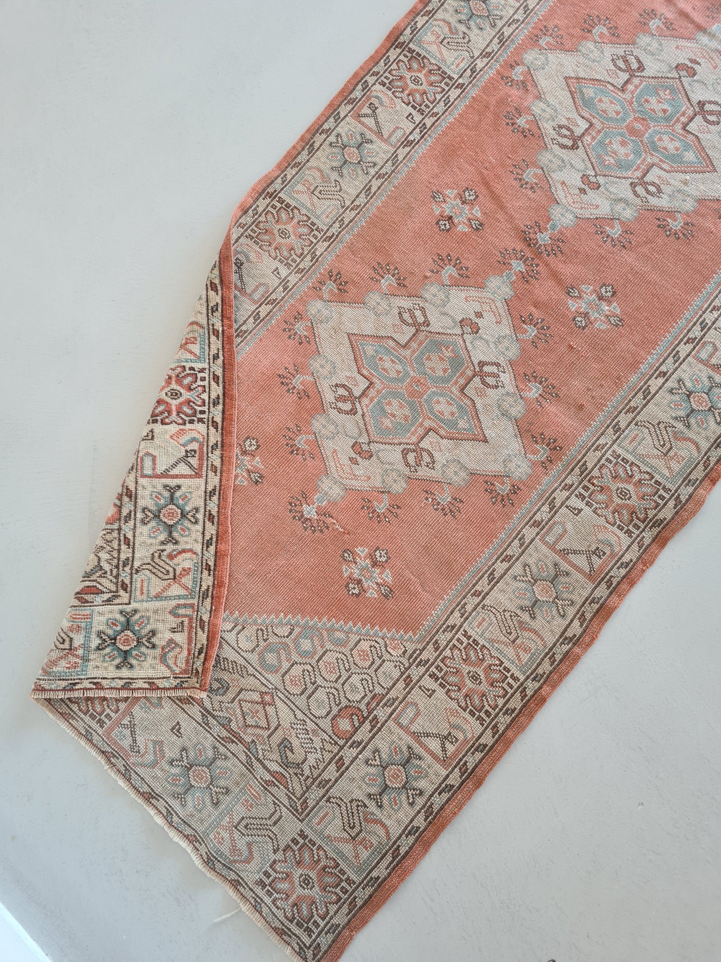 Deep peach runner rug. Florals