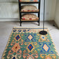 Vintage emerald green tribal rug