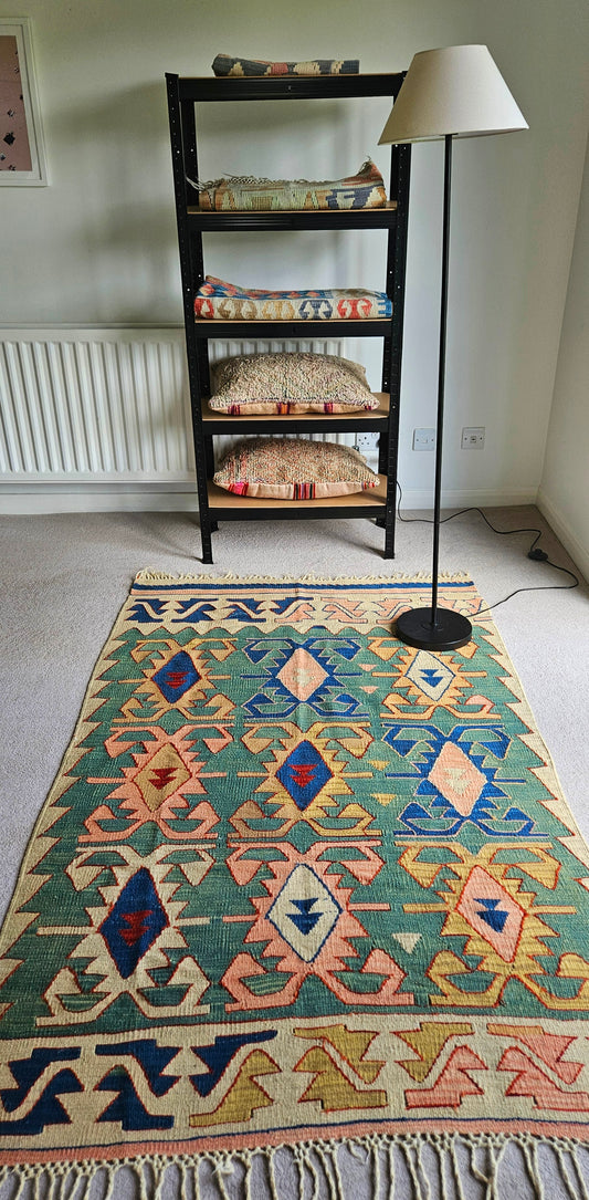 Vintage emerald green tribal rug