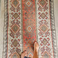 Burnt orange tribal kilim