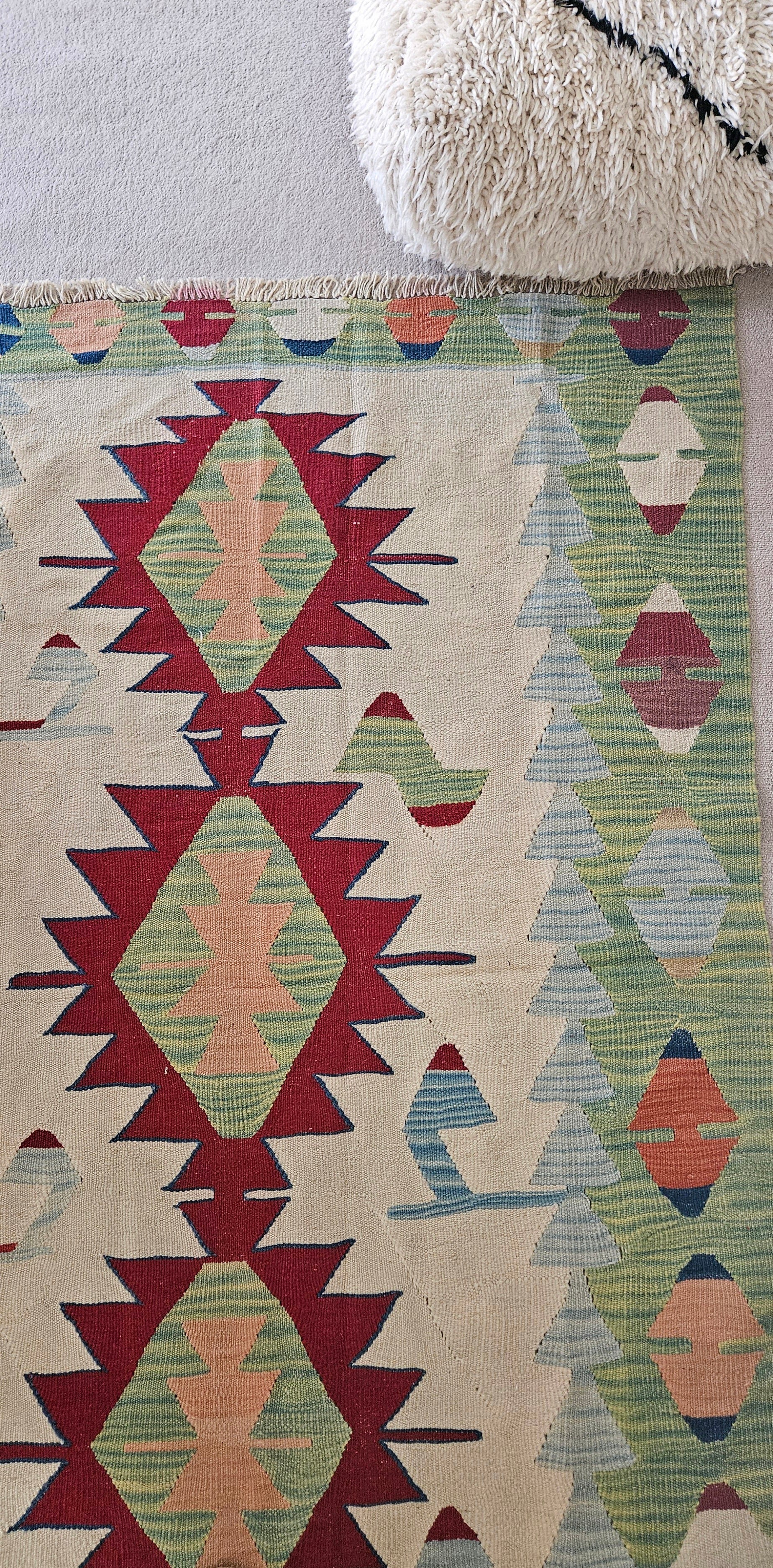 Bright and bold turkish kilim rug, vintage, accent size in green ivory and red. 