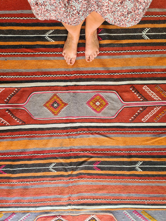 Vintage boho rug in warm earthy terracota 