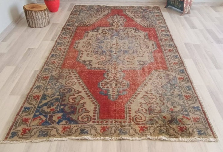 Classic red turkish rug. Floral vintage carpet.