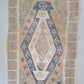 Vintage Turkish Kilim Rug in a muted palette, blues, buttery yellows and pale green